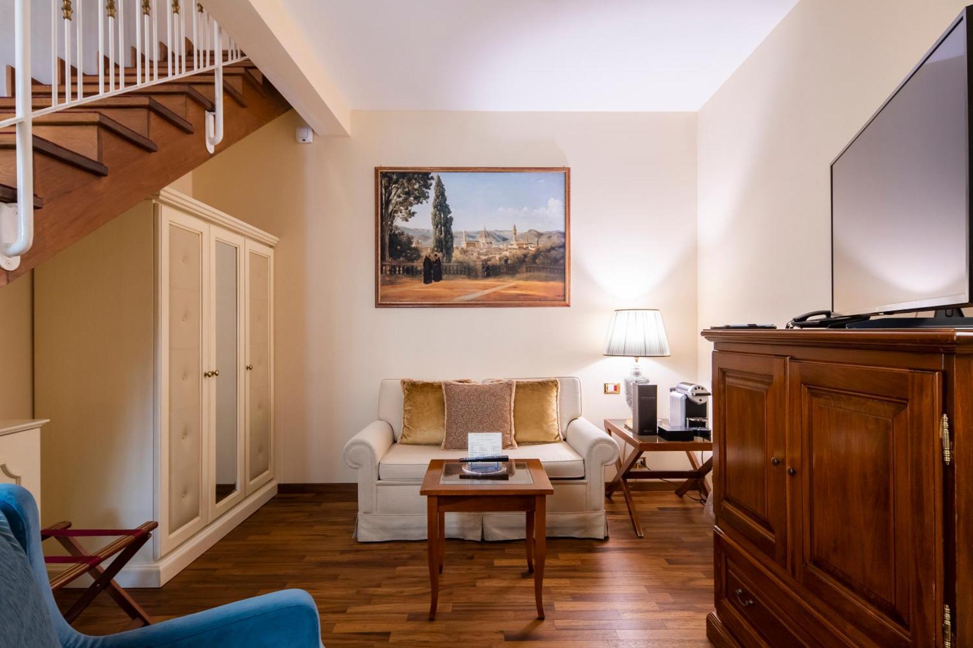 Golden Tower Hotel & Spa Firenze Bagian luar foto A room at the hotel