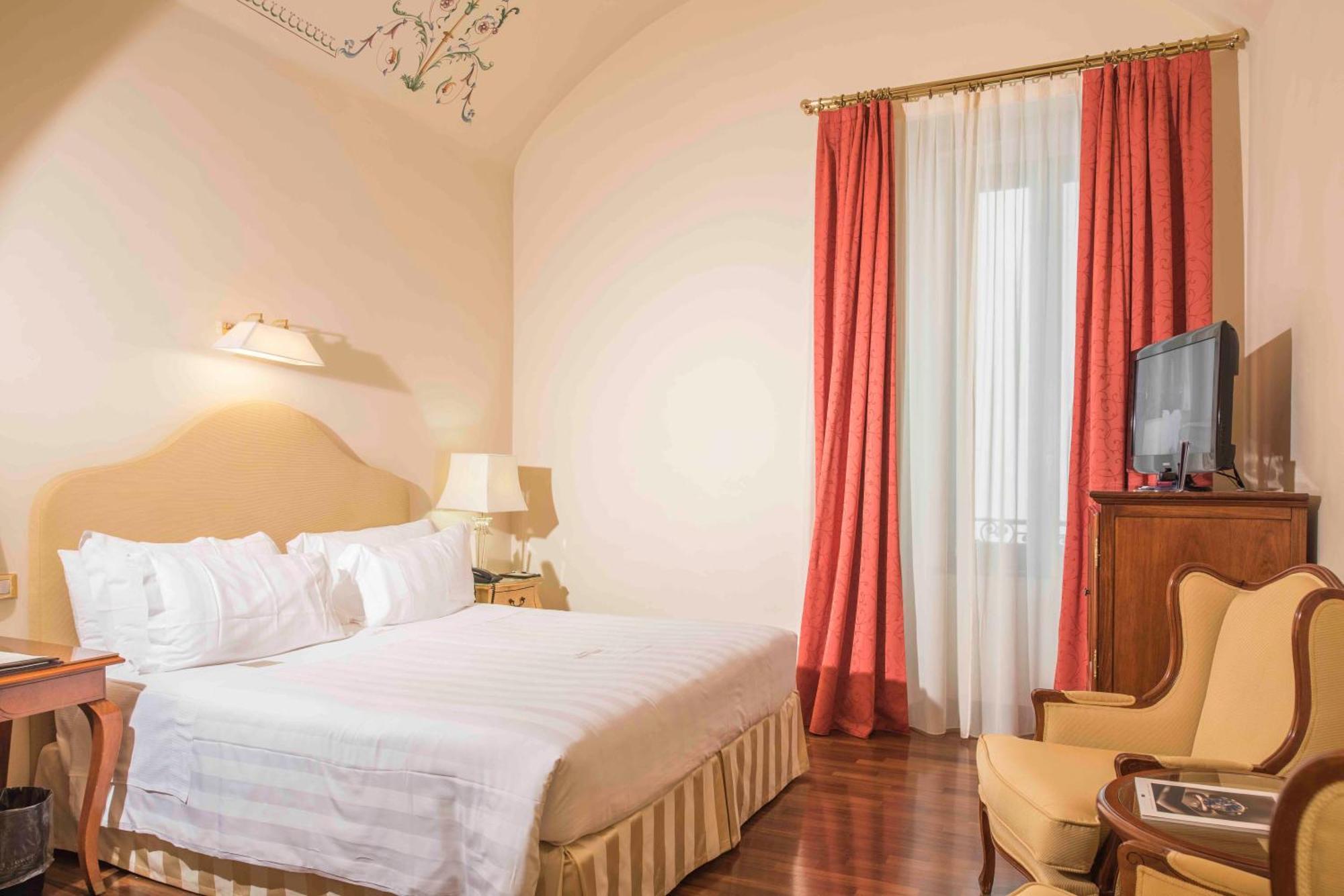 Golden Tower Hotel & Spa Firenze Bagian luar foto A room at the hotel