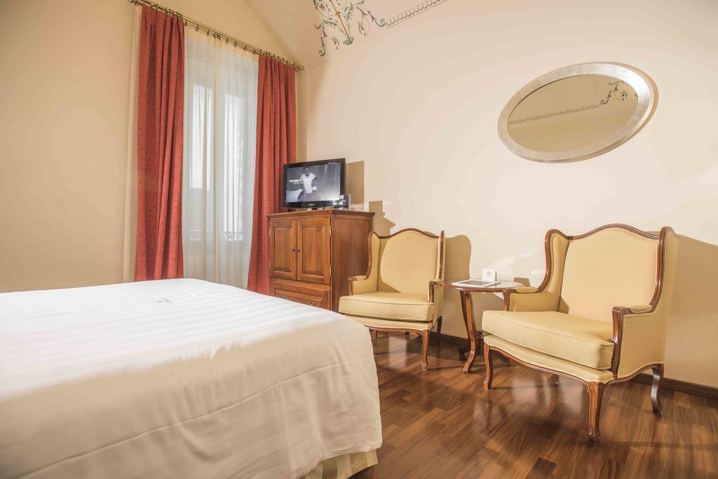 Golden Tower Hotel & Spa Firenze Bagian luar foto A room at the hotel